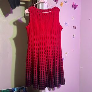 A cute little pleaded dress sleeveless goes about knee level